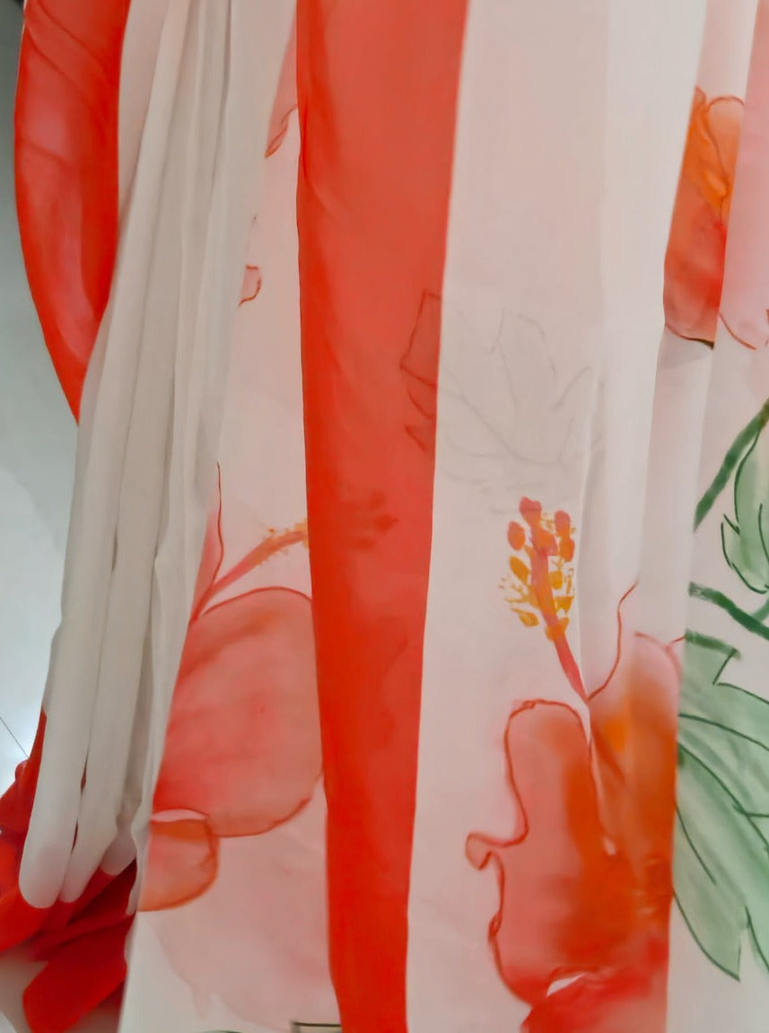Snow white organza saree with red hand painted and printed floral art