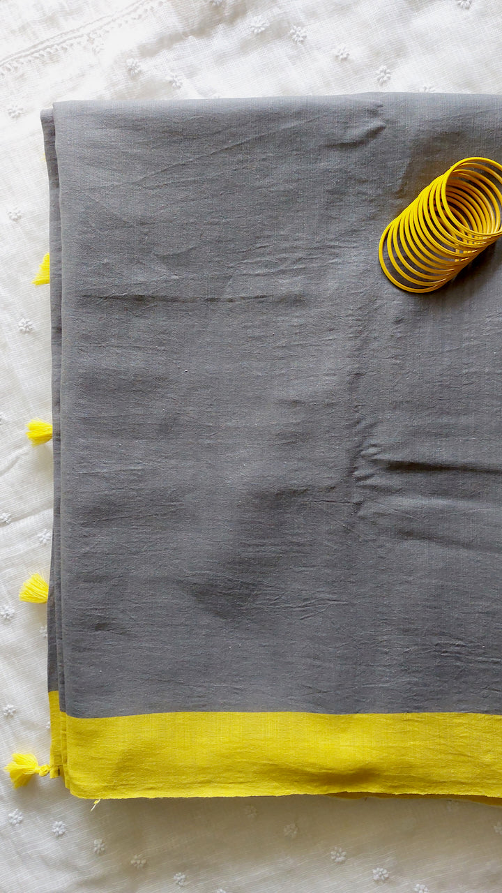 Linen Cotton handcrafted, naturally dyed running saree blouse in grey colour with yellow border.