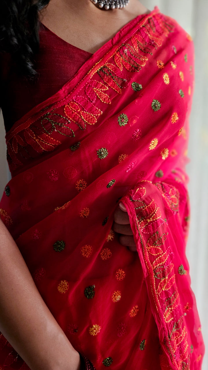 Tomato red saree with multihued silk thread hand embroidered chikankari saree by studio SY