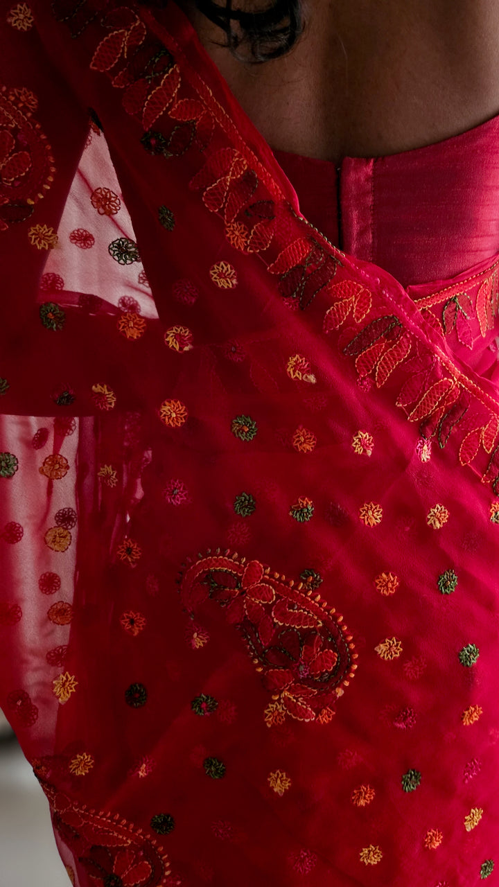 Tomato red saree with multihued silk thread hand embroidered chikankari saree by studio SY