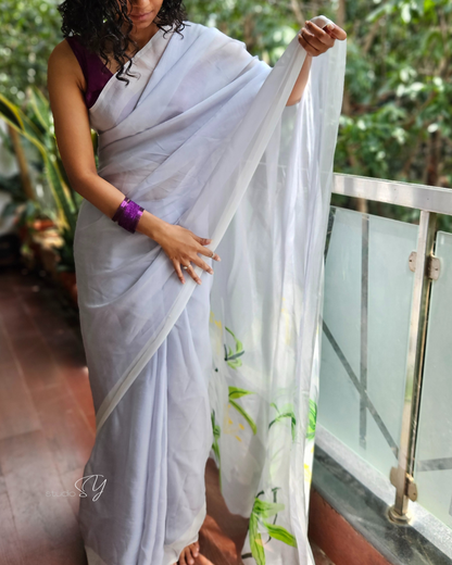 Dove grey organza saree with white hand painted and printed floral art