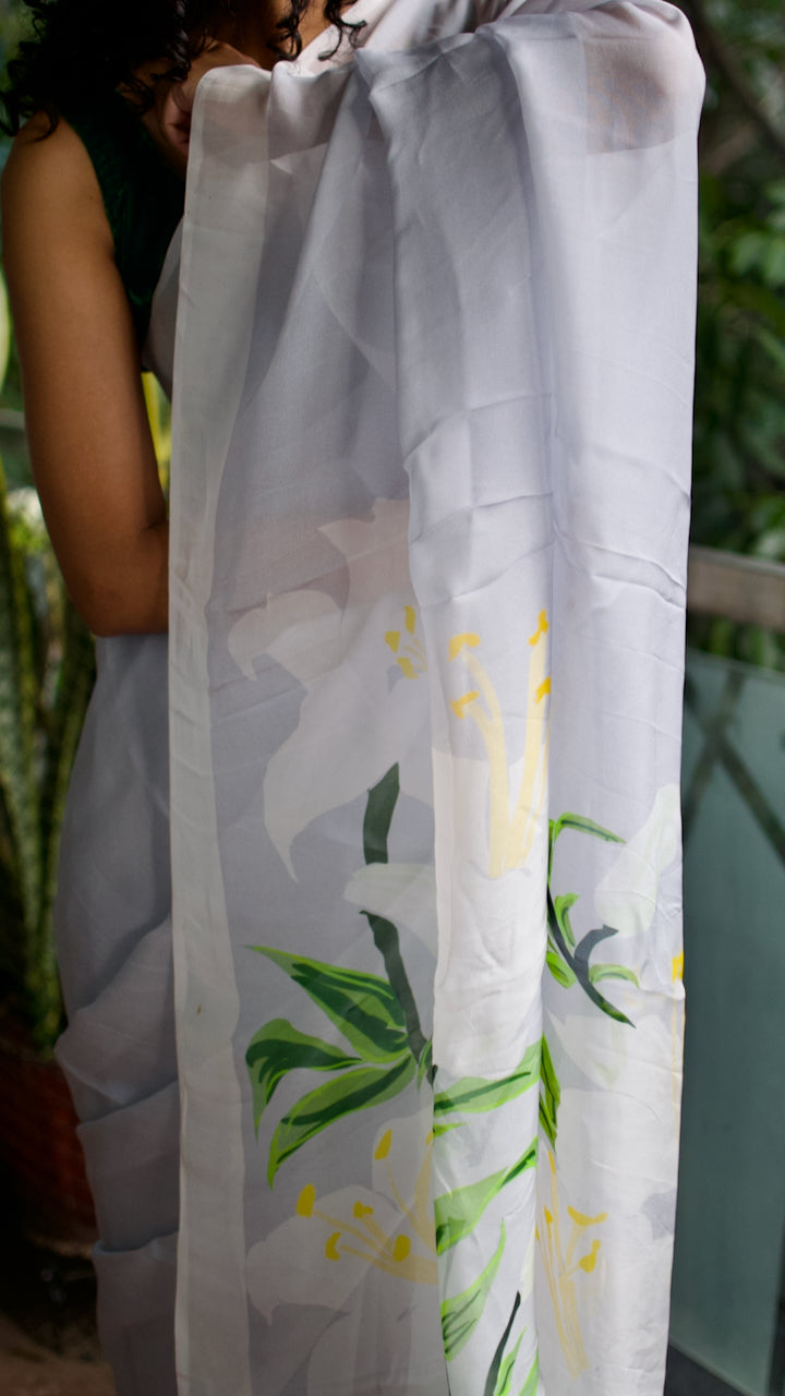 Dove grey organza saree with white hand painted and printed floral art