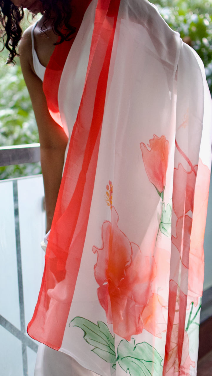Snow white organza saree with red hand painted and printed floral art