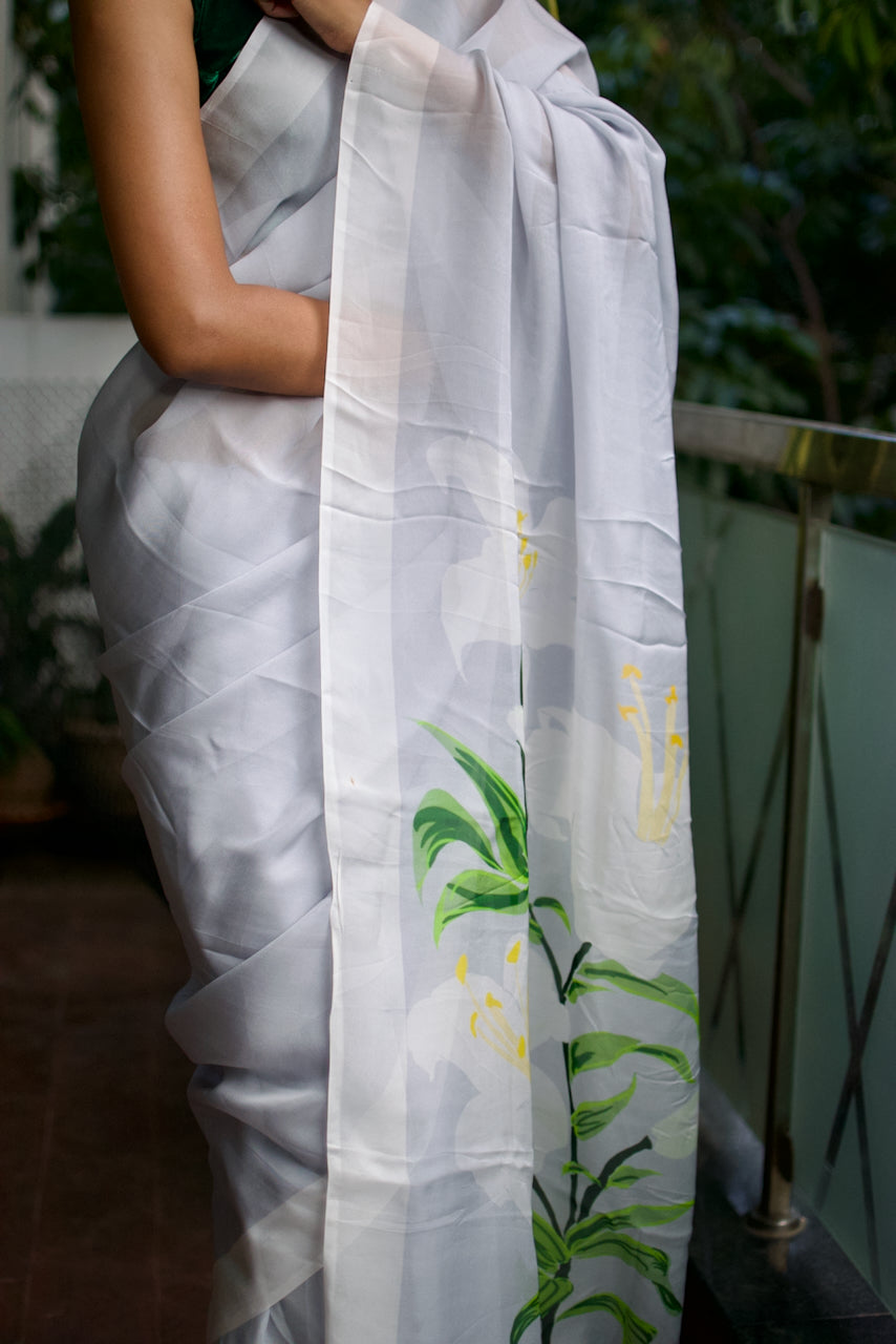 Dove grey organza saree with white hand painted and printed floral art