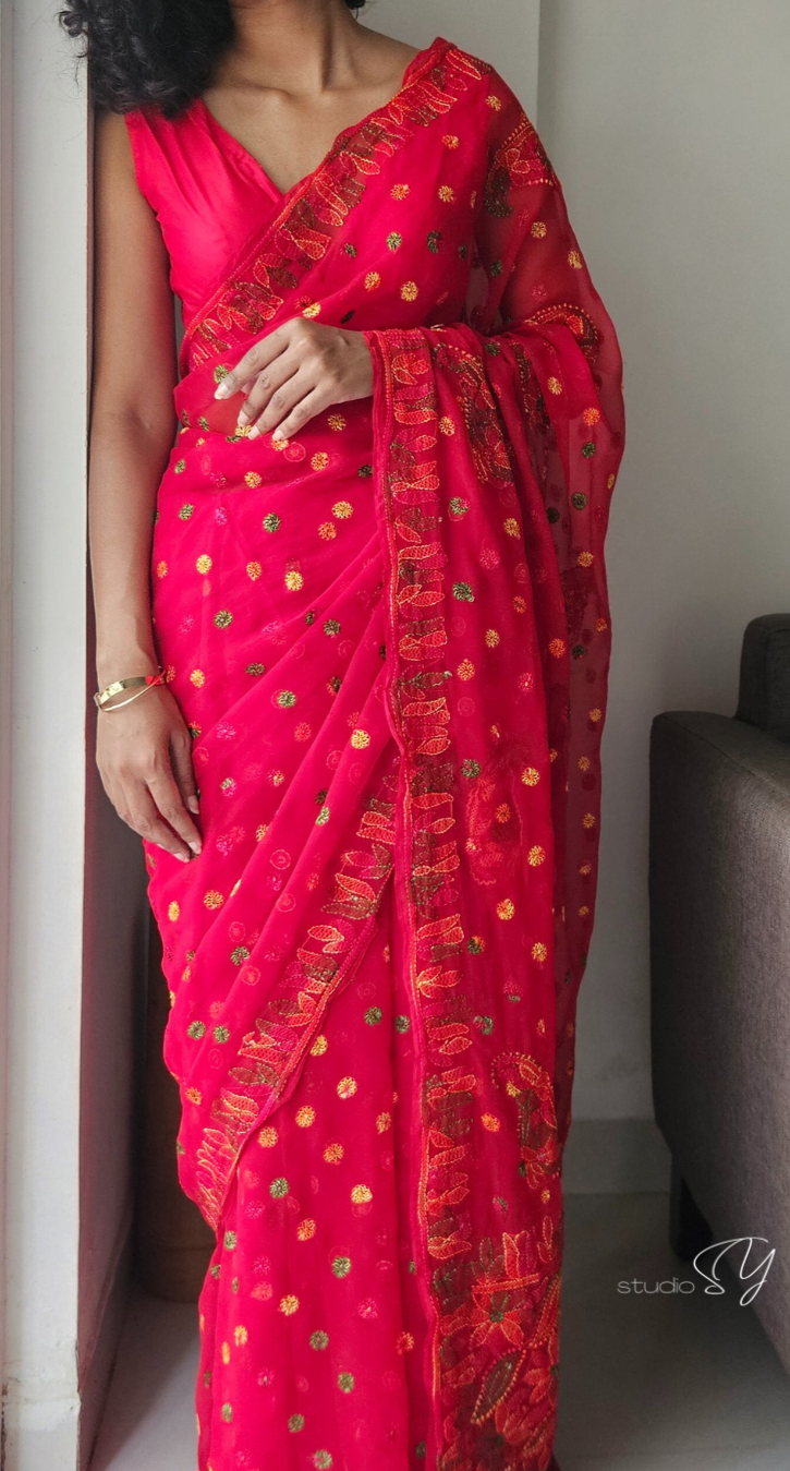 Tomato red saree with multihued silk thread hand embroidered chikankari saree by studio SY