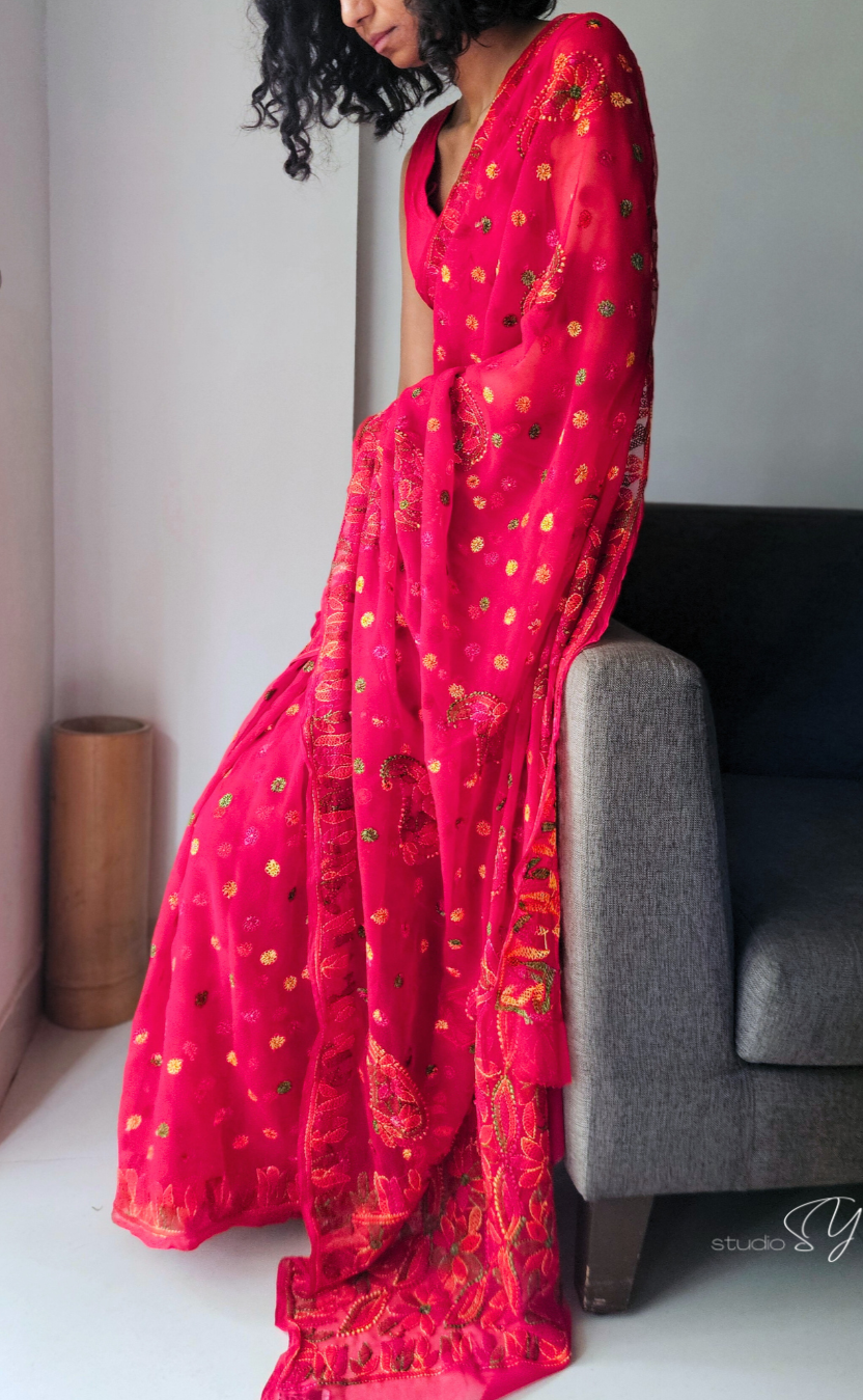 Tomato red saree with multihued silk thread hand embroidered chikankari saree by studio SY