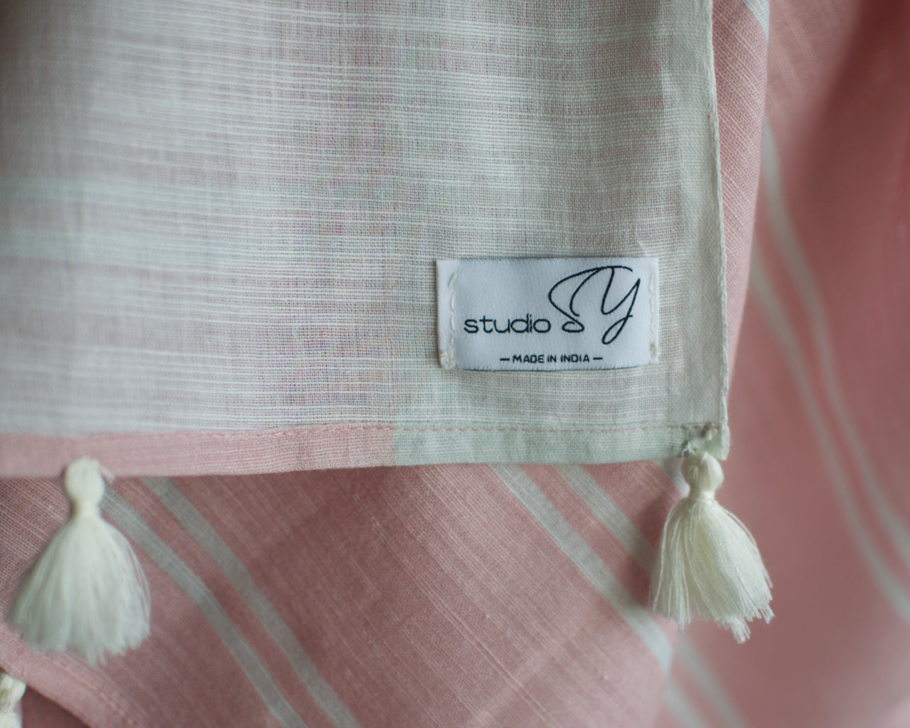 Linen Cotton handcrafted, naturally dyed saree in blush and cream colour.